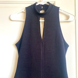 ASTR - tight black dress with cute slit in cleavage area - knee length